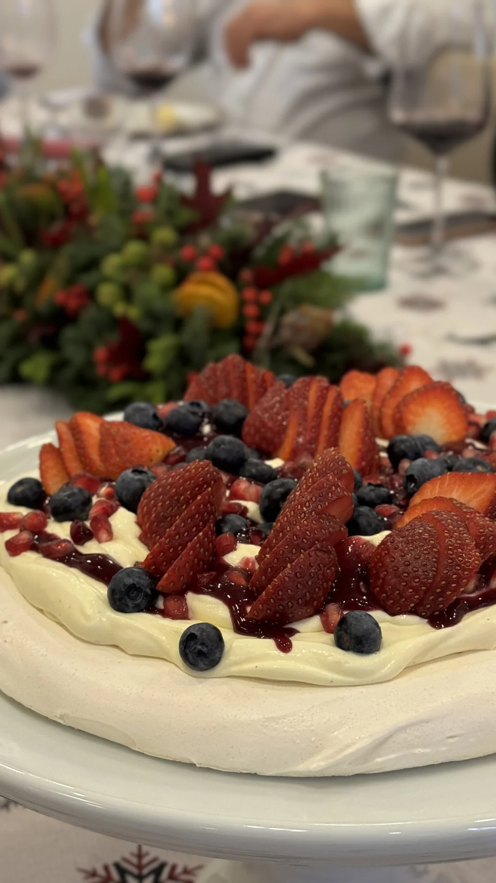 A celebration cake topped with fresh berries