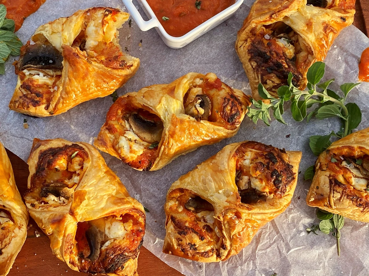 Golden savoury pastries with fresh herbs